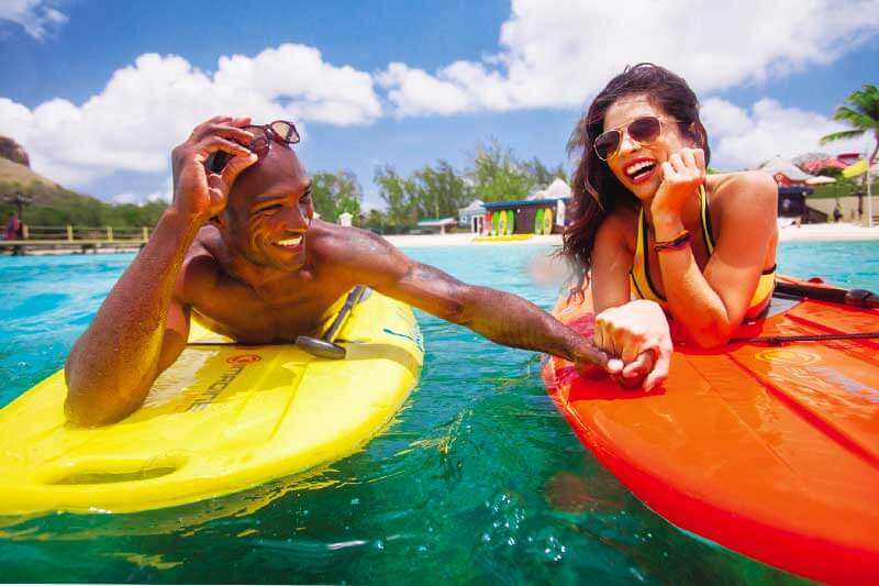 0920-beaches-versus-sandals-couple-paddleboards